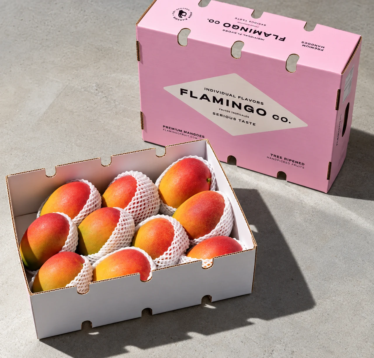 Fresh mangoes in a Flamingo Co. box