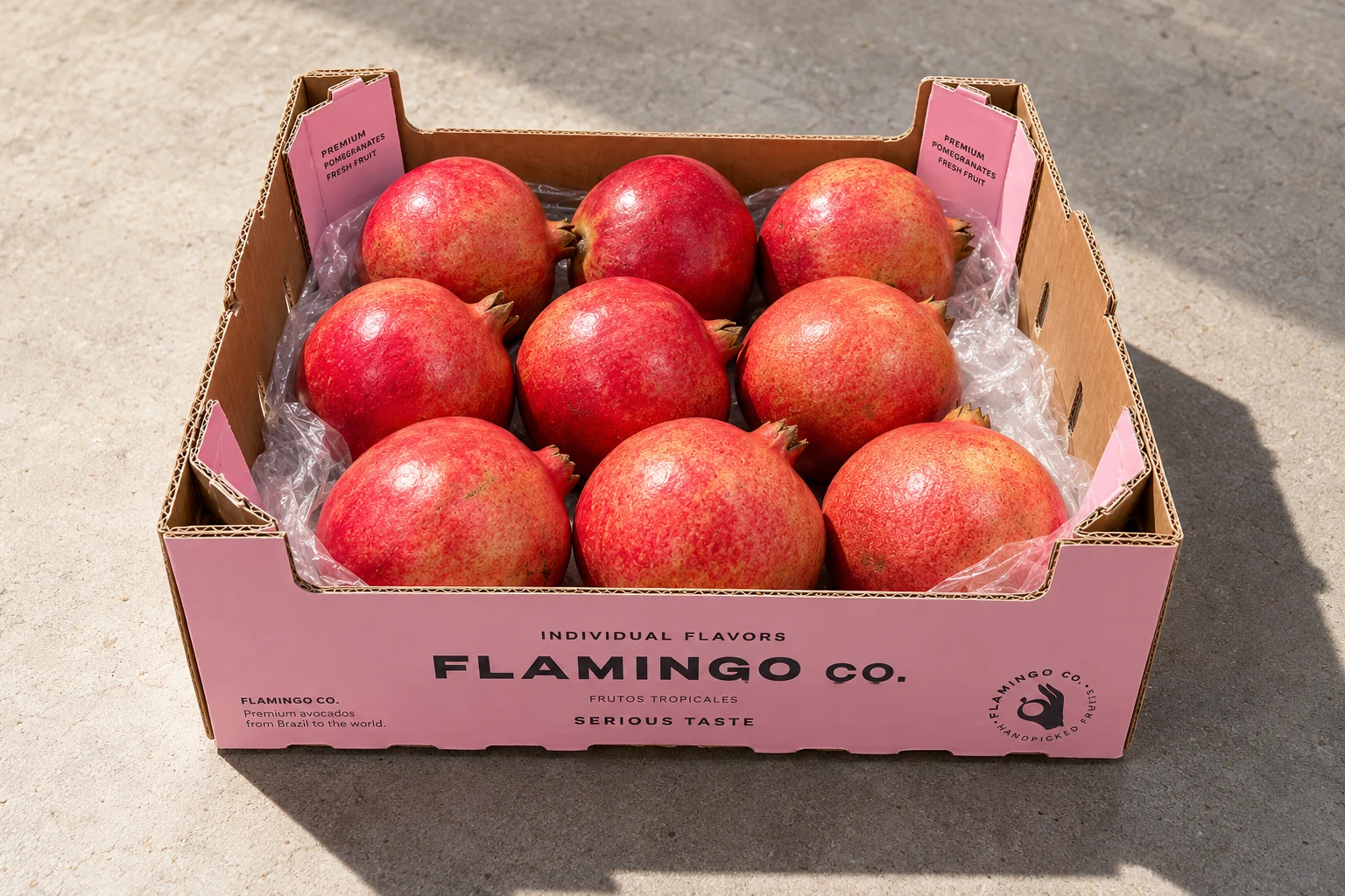 Pomegranates in Flamingo Co. packaging