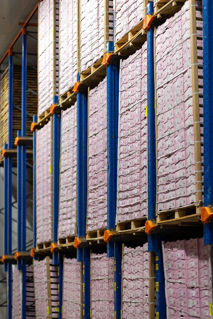 Flamingo fruit cartons stacked in the packing warehouse